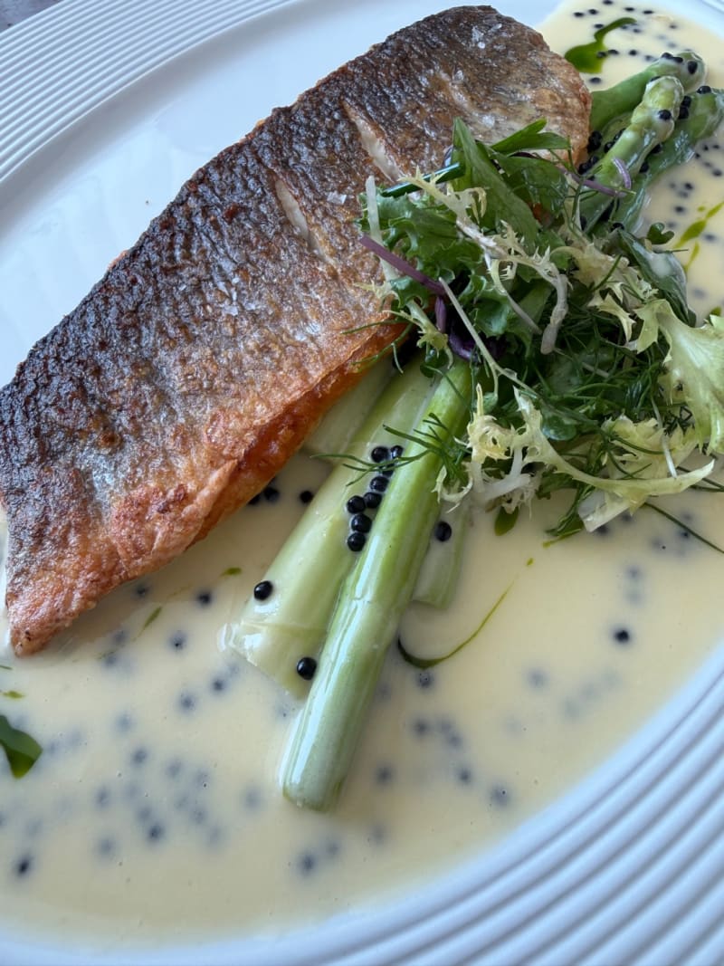 Sea Bass with Caviar Beurre Blanc at Commodore Club - Marsa Al Arab