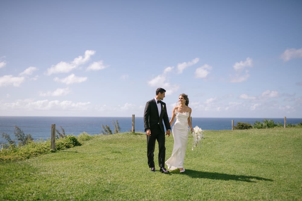Wedding couple on the bluff above Hanalei Bay at 1 Hotel Hanalei Bay Kauai