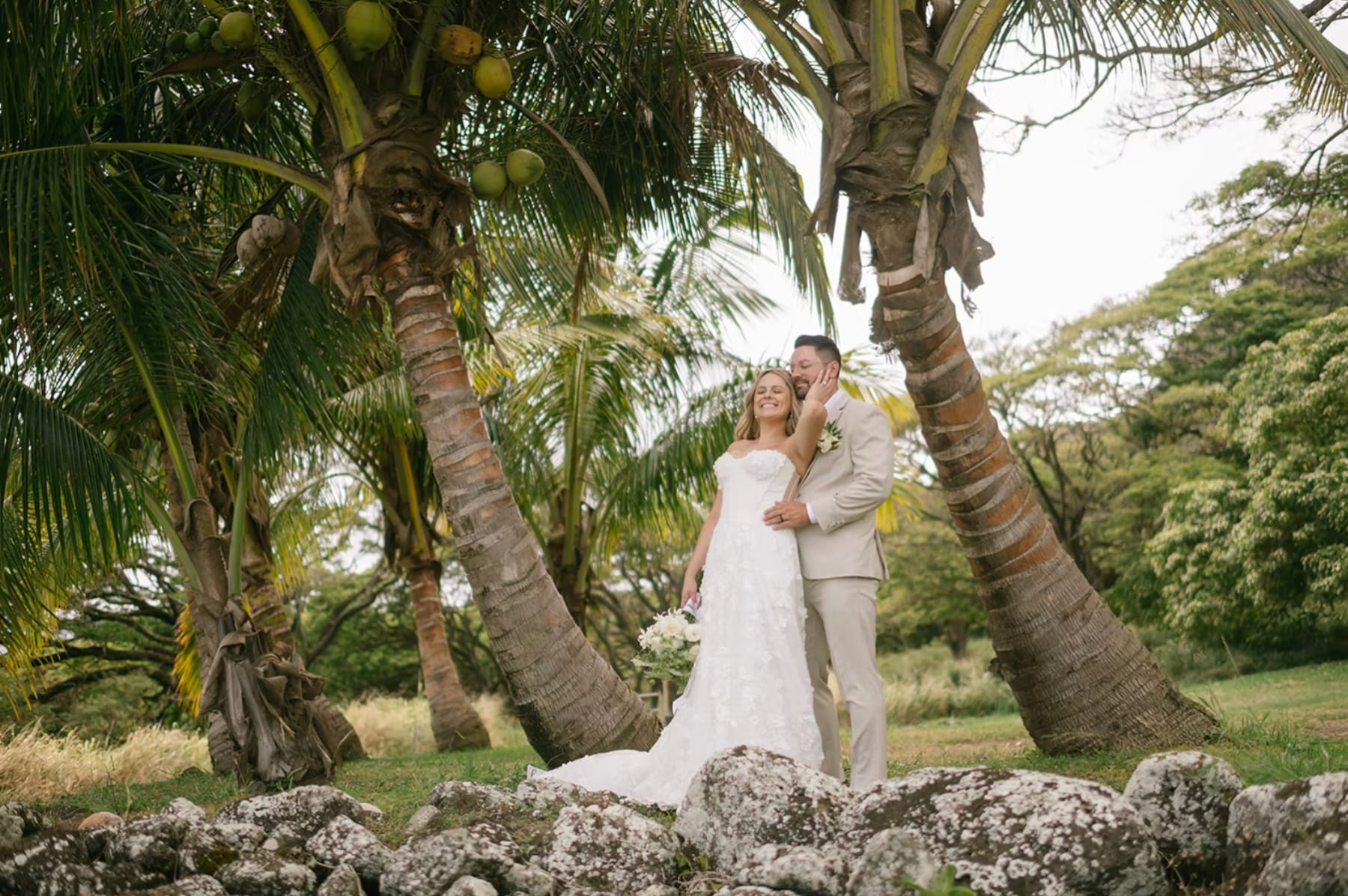 Bride and groom by the sea at a Hawaii wedding