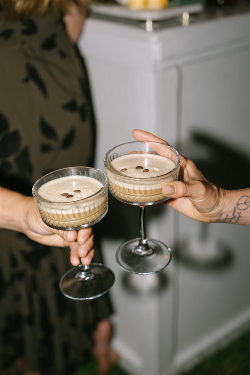 Espresso martini cheers during a Kualoa Ranch wedding reception on Oahu