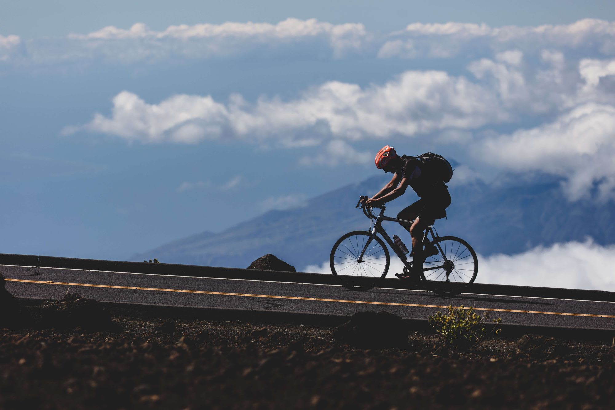 Man cycling uphill