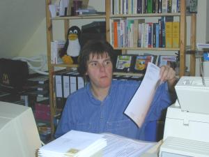 fppaper.jpg: She's checking her list...