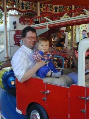 carousel: PapaScott & Christopher are riding the fire truck