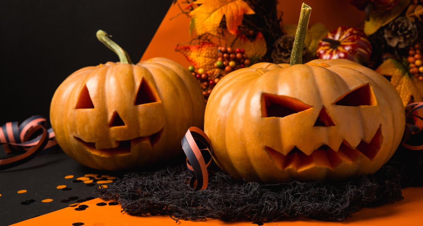 Two carved Halloween pumpkins