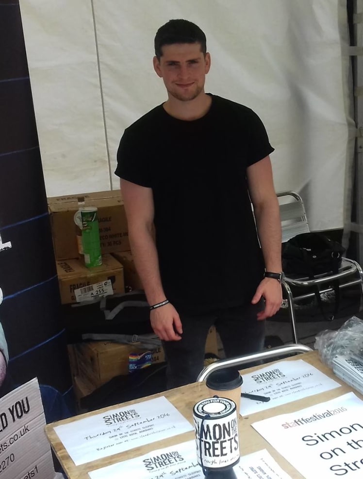 Tom managing a stall