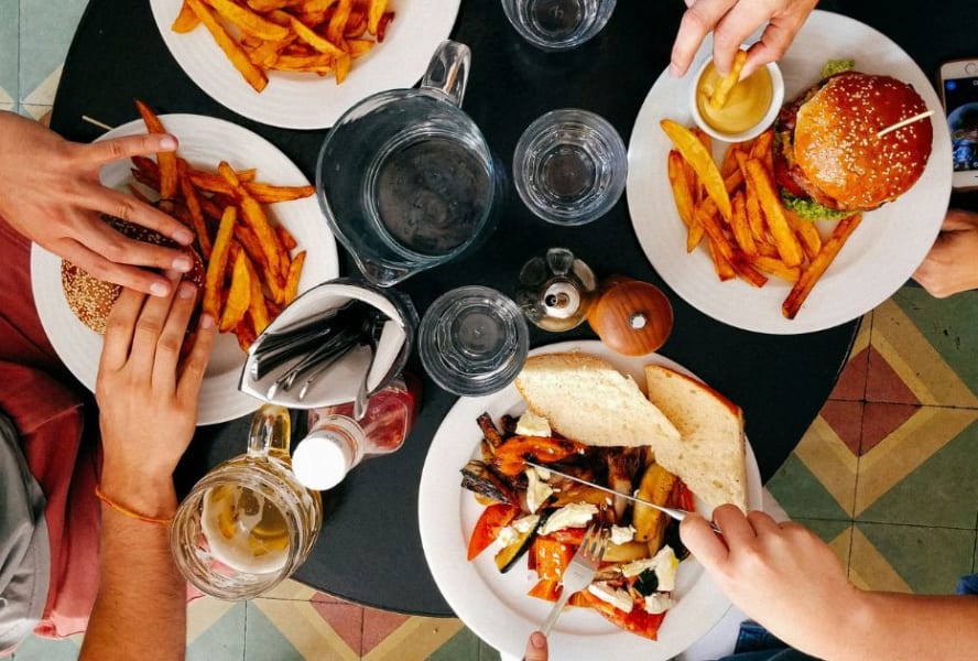 Burgers and chips on a table