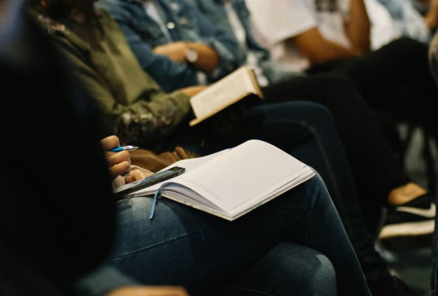 Notebook open on a student's lap