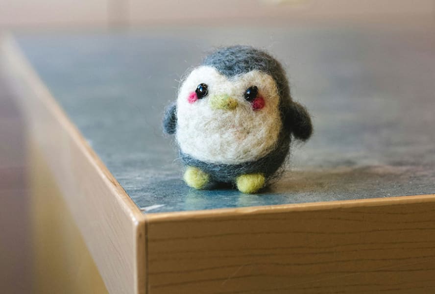 Needle felted small penguin