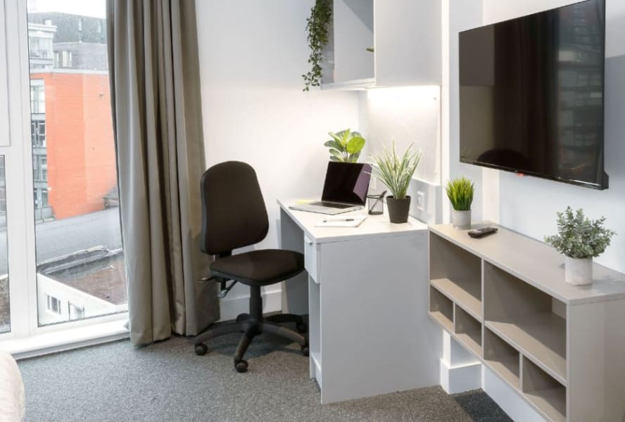 Sheffield room for students with a desk area, TV and window