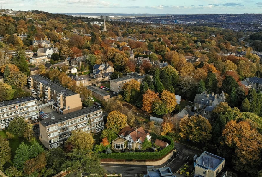 Sheffield landscape with buildings and trees.