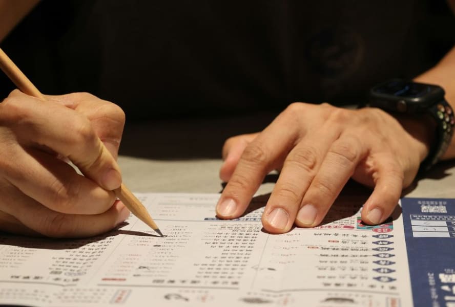 Student filling in a worksheet