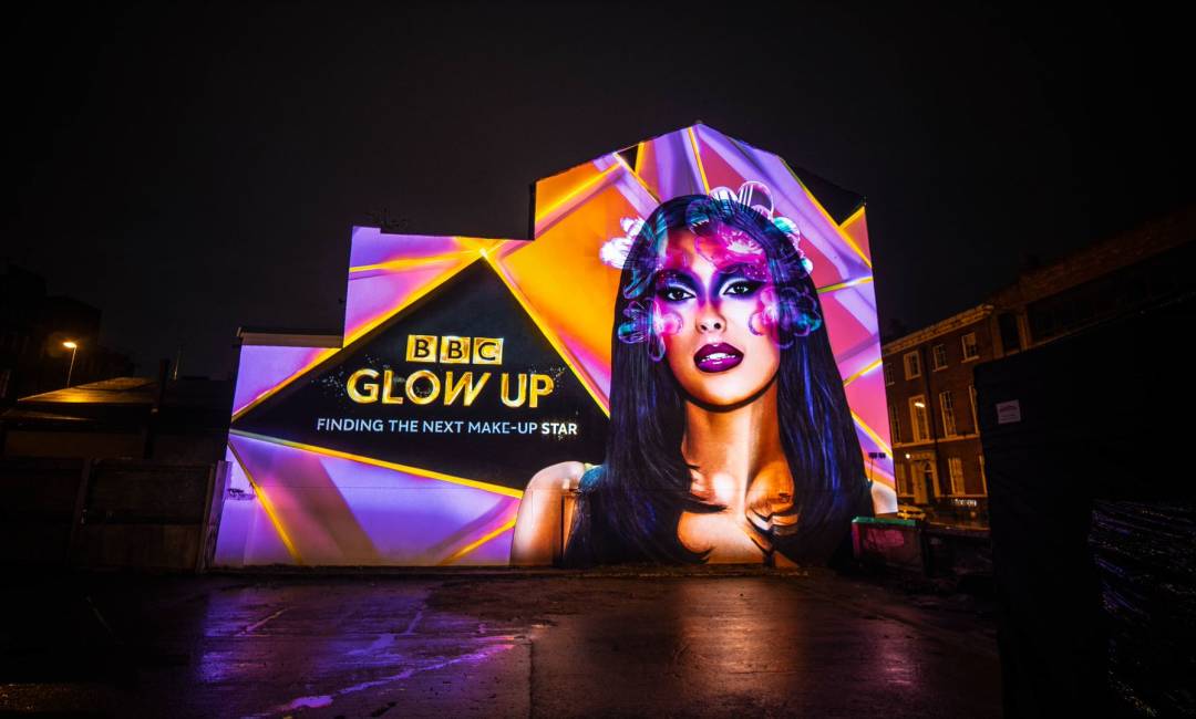 BBC Glow Up advert projected onto a wall