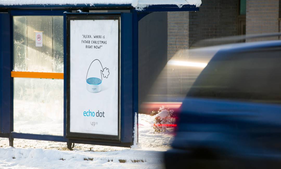 Bus stop showing Amazon echo dot advert