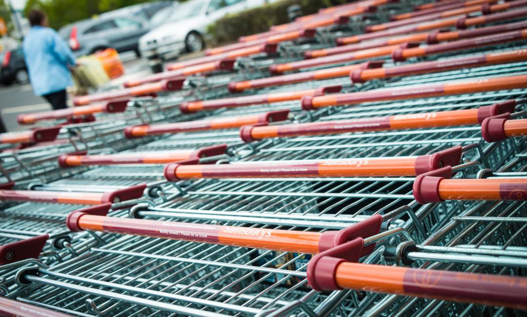 Photo of top of Sainsbury's shopping trollies in car park