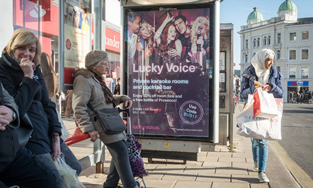 A local Karaoke advert on an Adshel Live panel