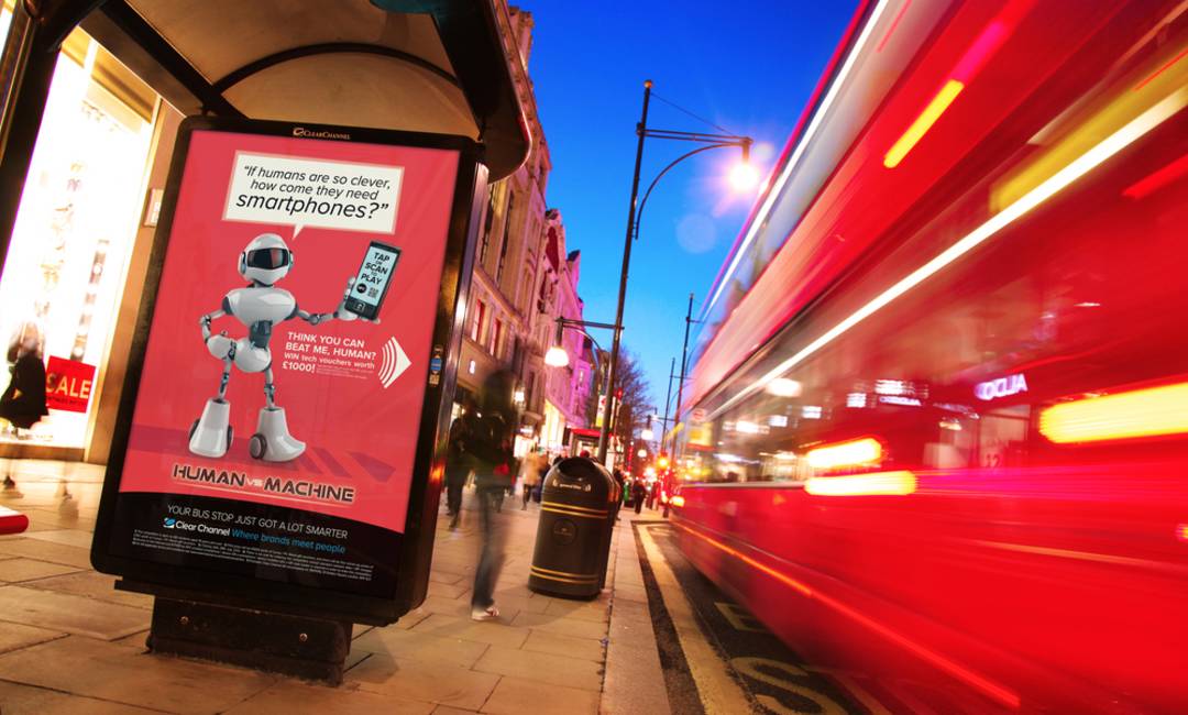 Adshel screen on a bus stop showing Clear Channel UK’s first permanent high street mobile platform for outdoor media.