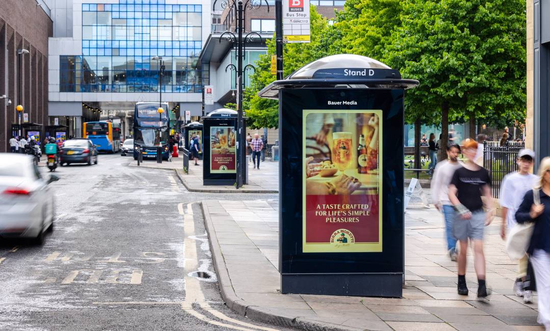 Roadblock activation displaying Birra Moretti campaign across DOOH screens
