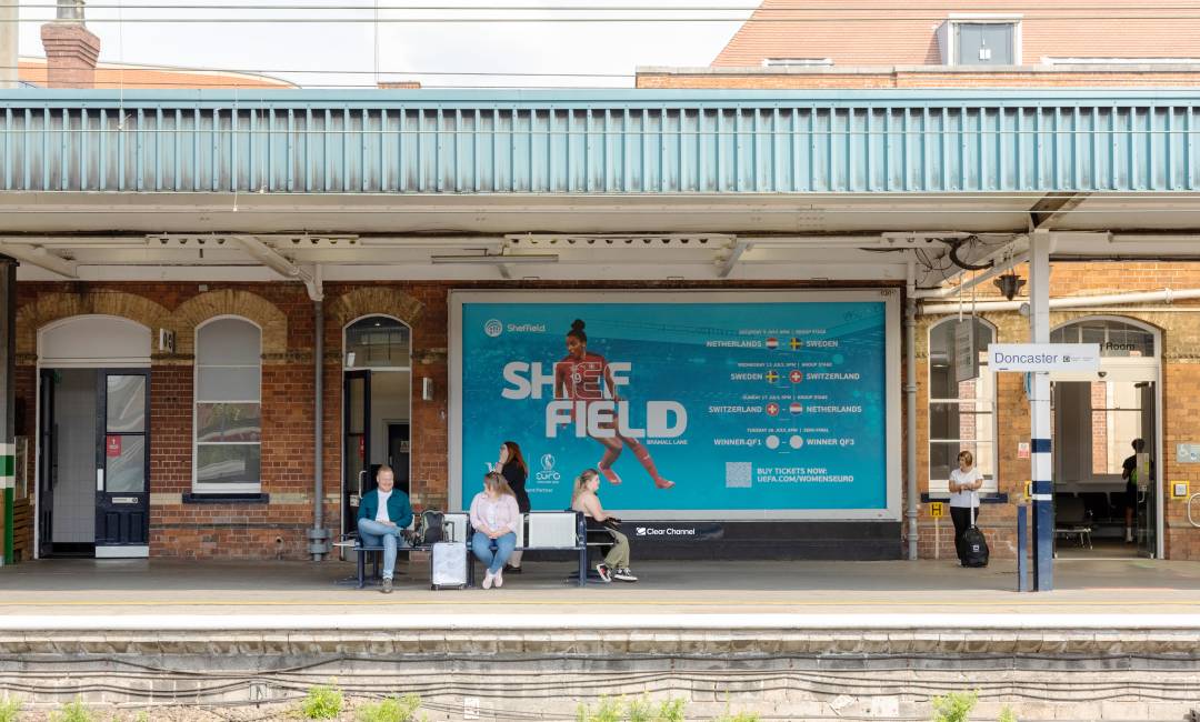 Large billboard on Doncaster station platform showing as for Womens Euros