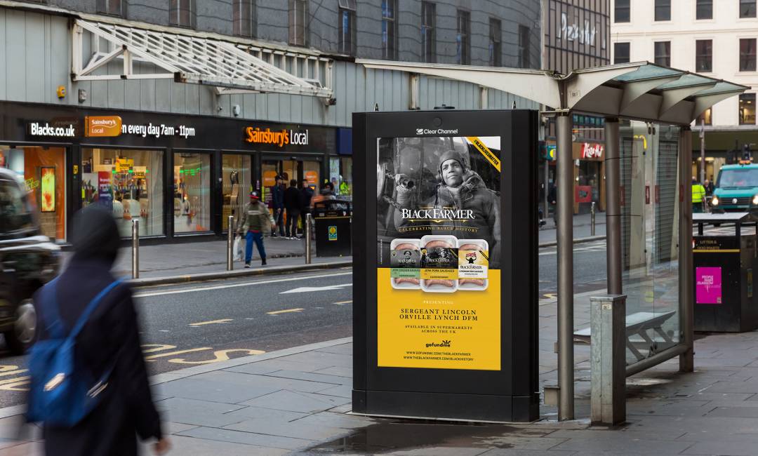 Digital screen on a bus stop showing Black Farmer ad