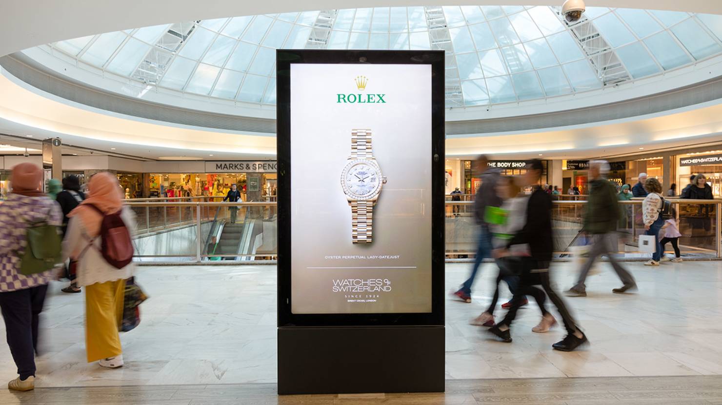 Watch brand on digital advertising screen in a shopping mall