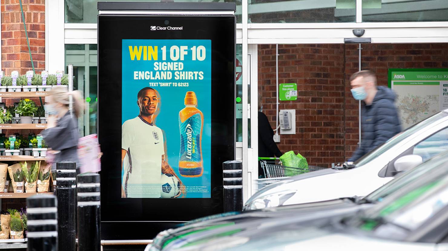 Lucozade ad outside an Asda supermarket supporting the euros football tournament with a competition to win a signed England shirt