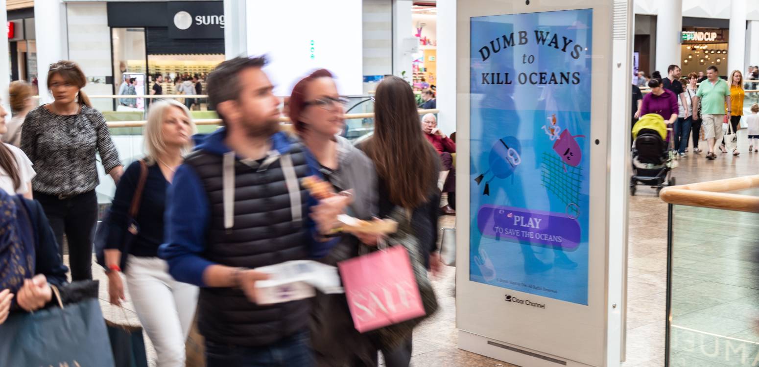 World Ocean Day interactive advert on digital screen in shopping mall with people