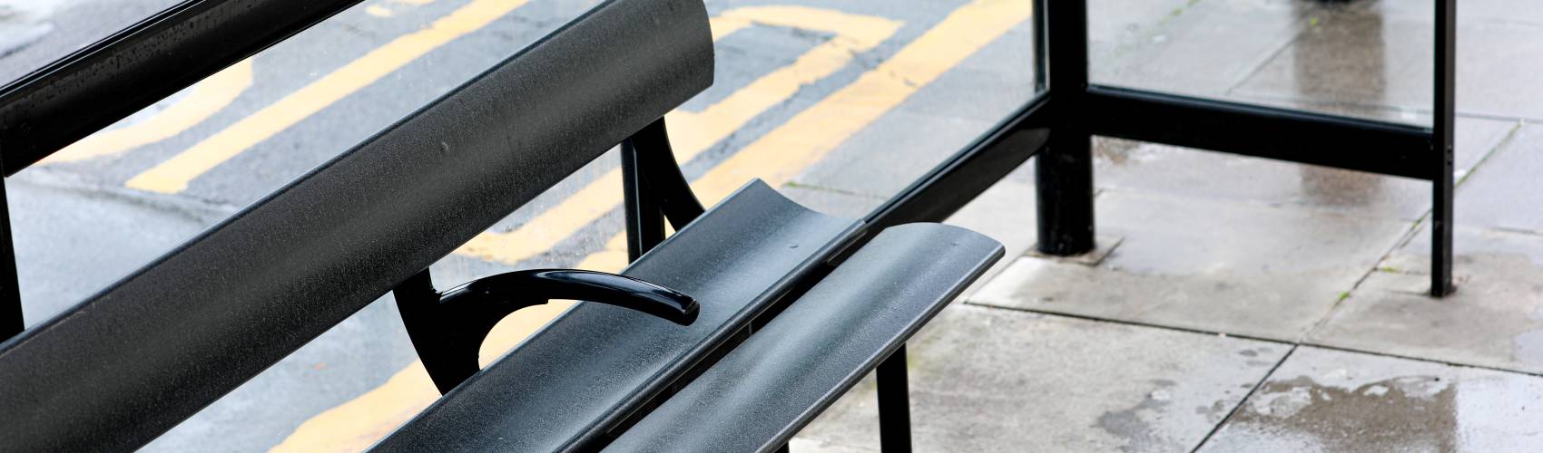 A bus shelter seat.