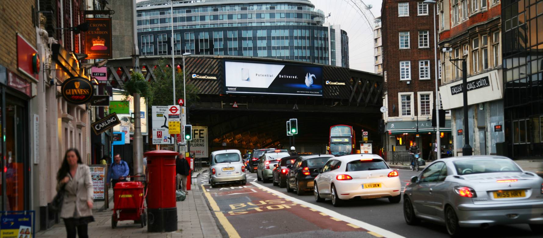 Clear Channel Storm site on a busy road showing Standard Life advert