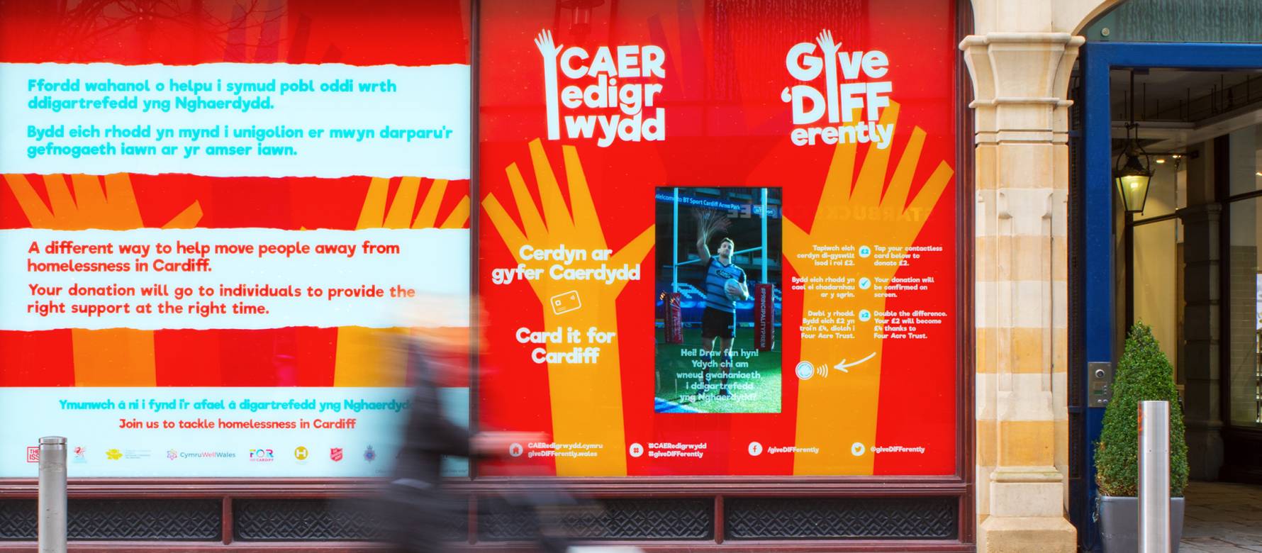 Shop front displaying interactive campaign for ‘FOR Cardiff’