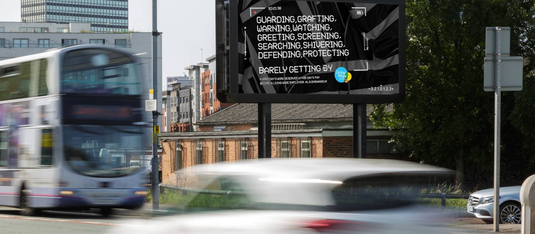 Billboard Live screen showing Living wage campaign