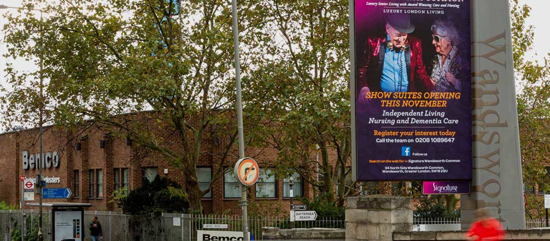 A large format advertising panel in Wandsworth showing an ad for a property development