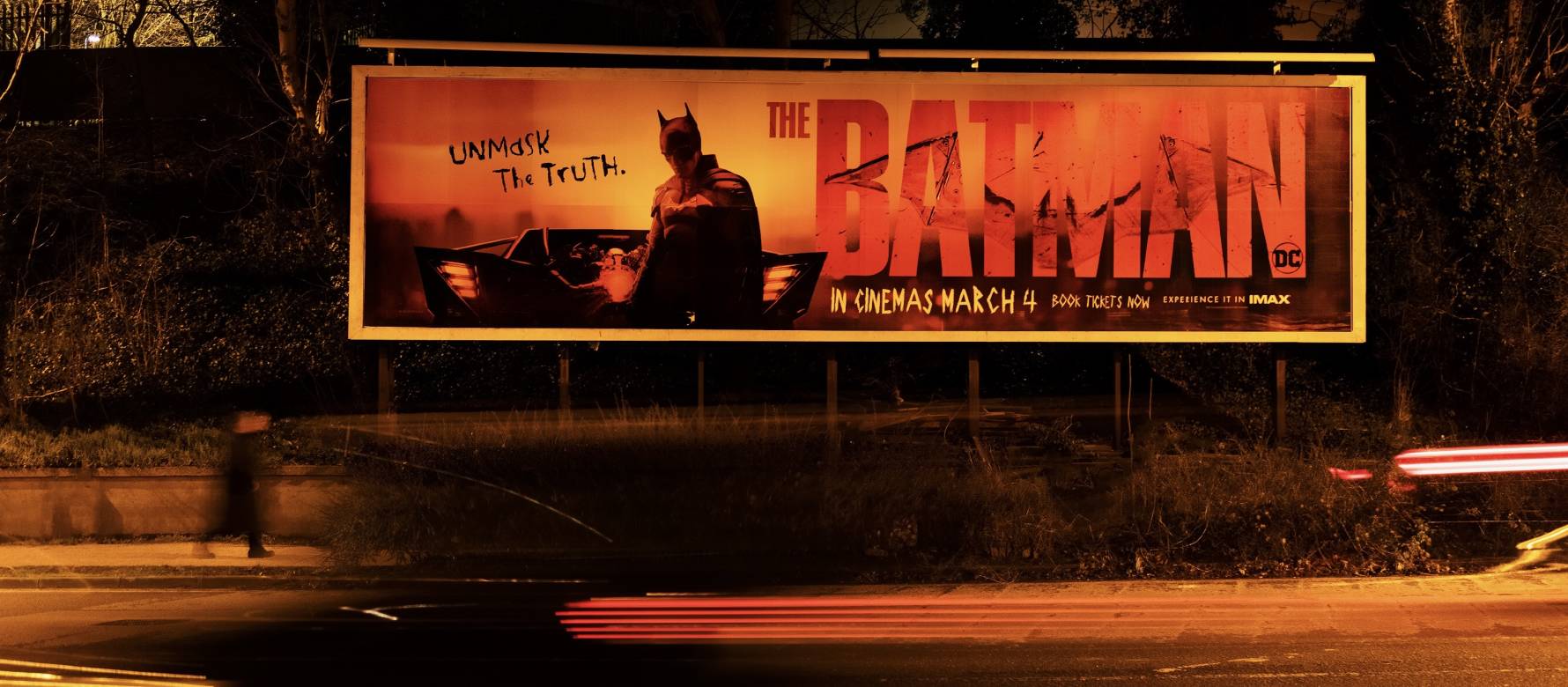 Billboard displaying The Batman movie at night