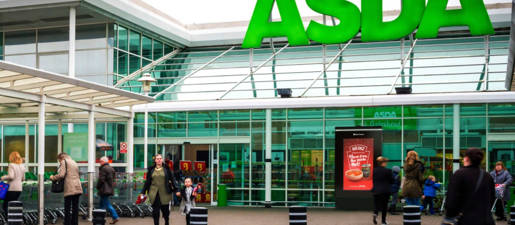 Picture outside a Asda shopping centre featuring a Heinz campaign on digital out of home