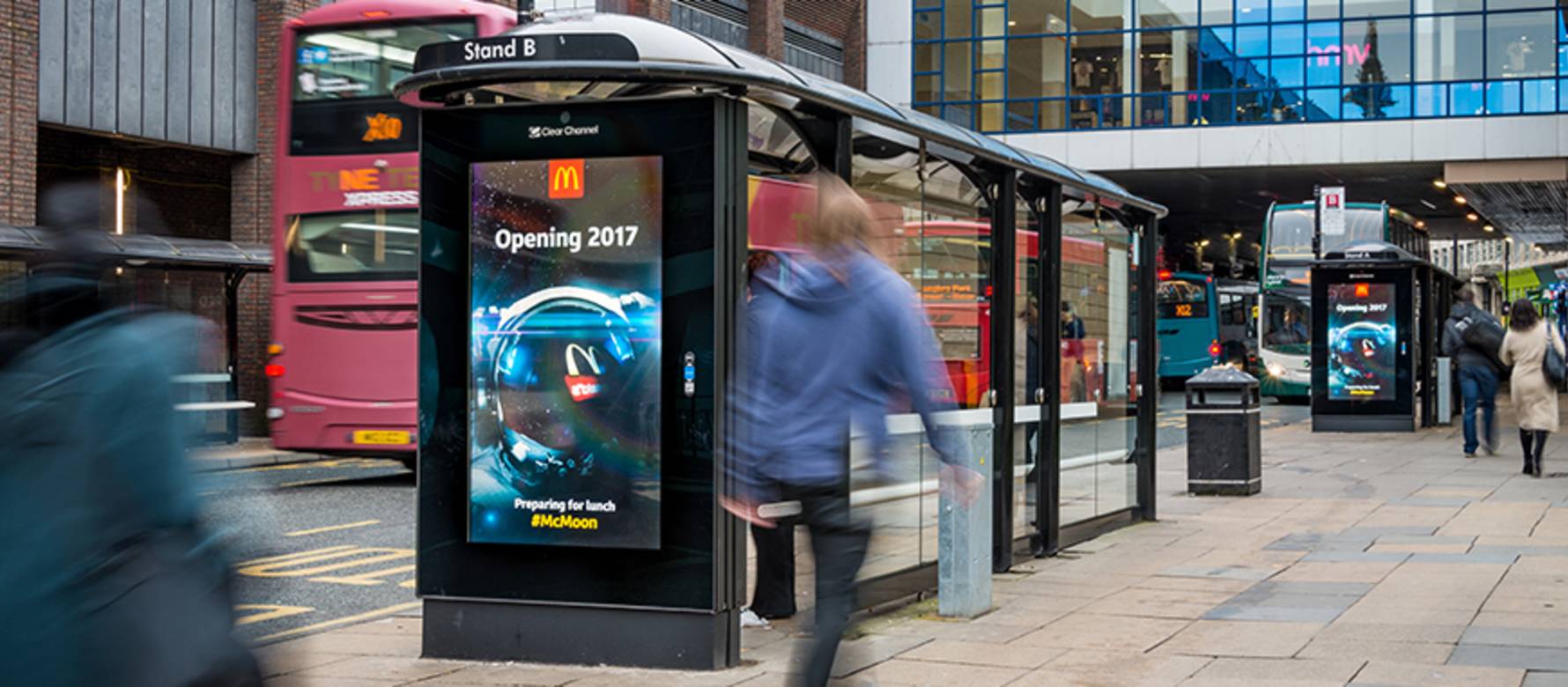 Adshel Live screen on bus stop showing Mcdonalds advert