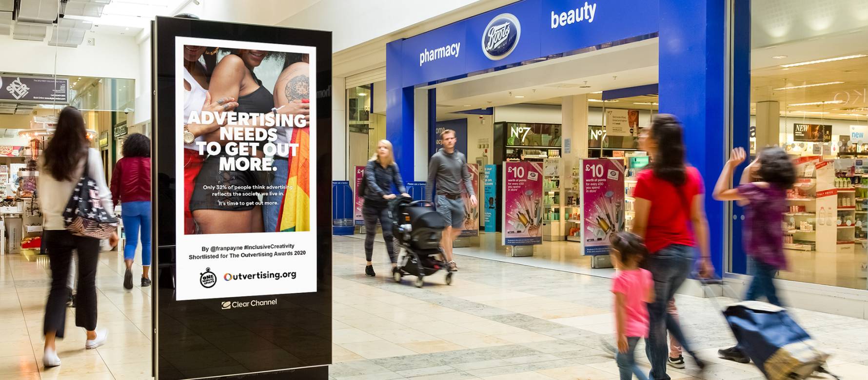 A adshel live panel advertising our campaign with Outvertising inside a mall.