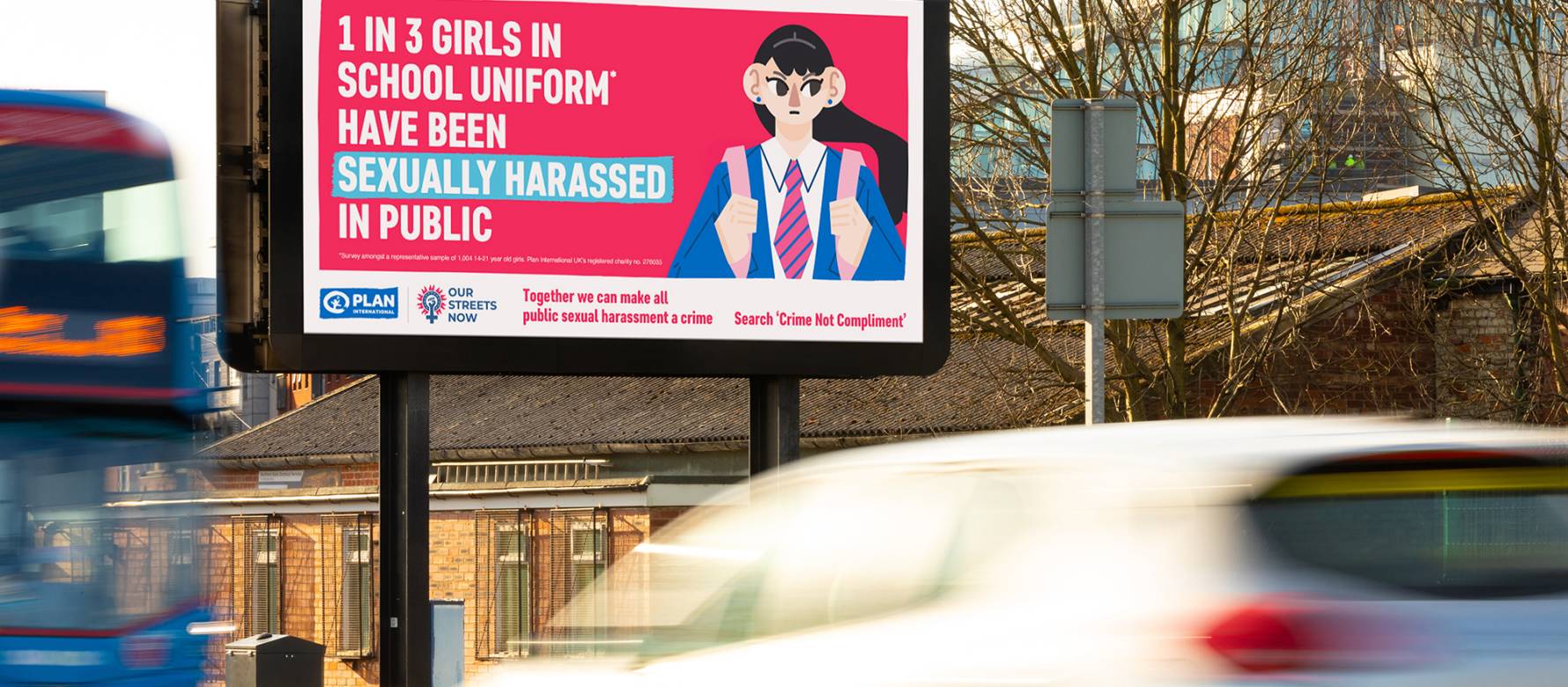 Large billboard showing ad for Plan International UK