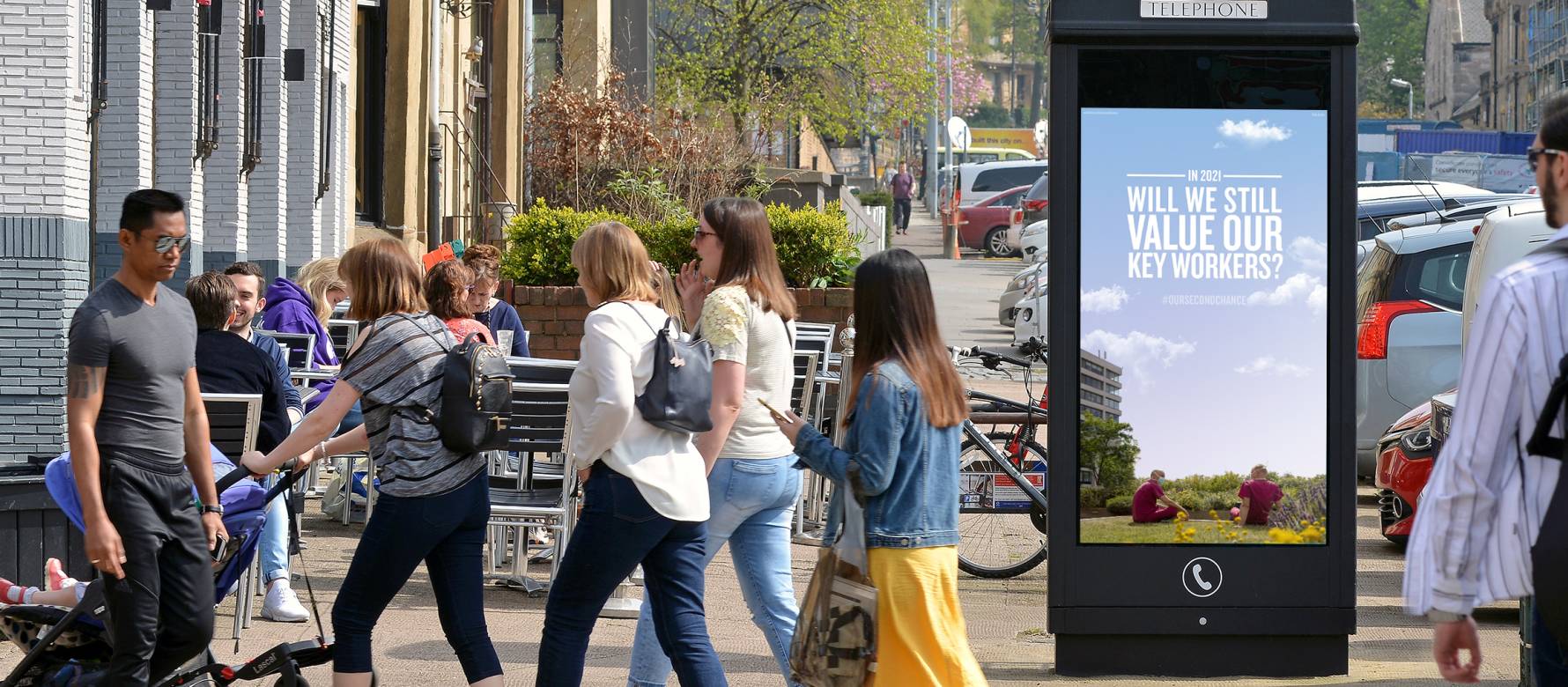 Adshel Live phone box showing #oursecondchance campaign