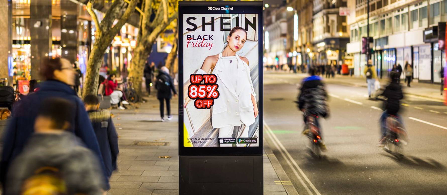 Shein advertising campaign in the evening with cyclists and walkers going past