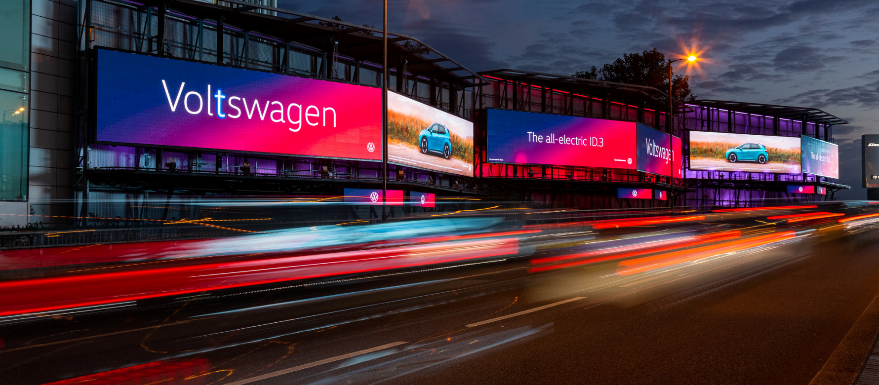 Clear Channel Voltswagen campaign on Storm Cromination featuring a blue VW electric vehicle