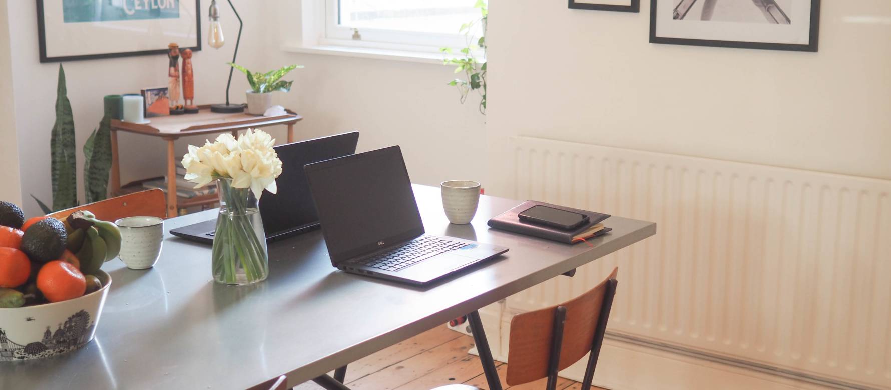 Photo of a laptop on a living room table.