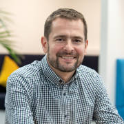 George Manns, Portfolio Strategy Director at Clear Channel UK, smiling