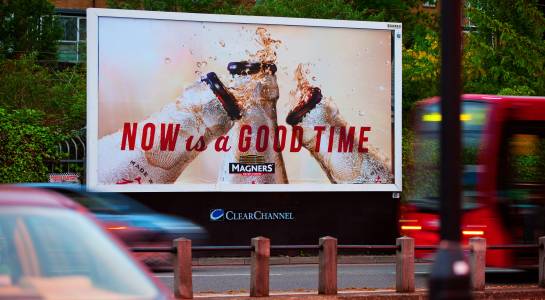 A Magners ad on a Clear Channel roadside billboard