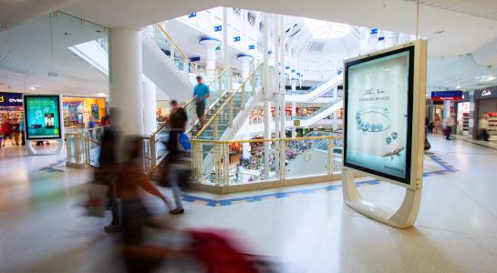 An advertising panel in a shopping mall, part of Clear Channel's acquisition of Foxmark