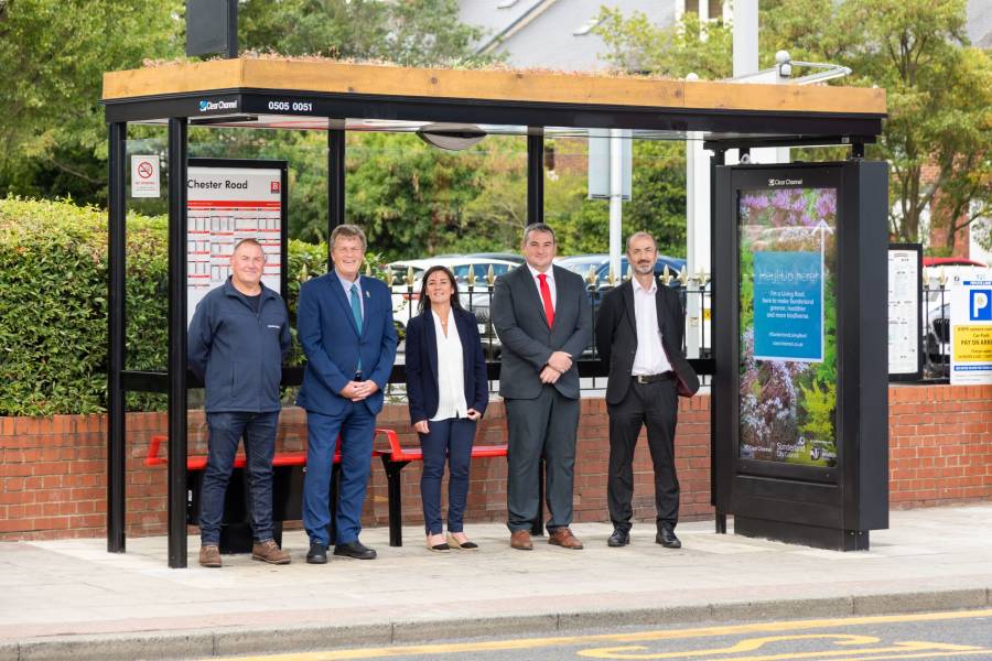 Photo of Sunderland council employees standing next to a Clear Channel Living Roof