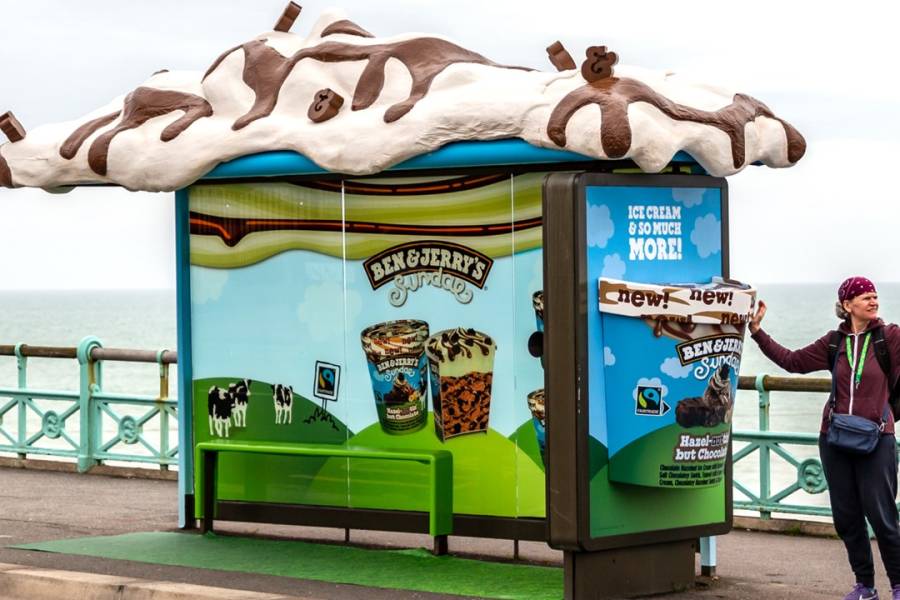 A special build bus shelter promoting Ben & Jerry's ice cream featuring a mock ice cream tub and melted ice cream on the roof