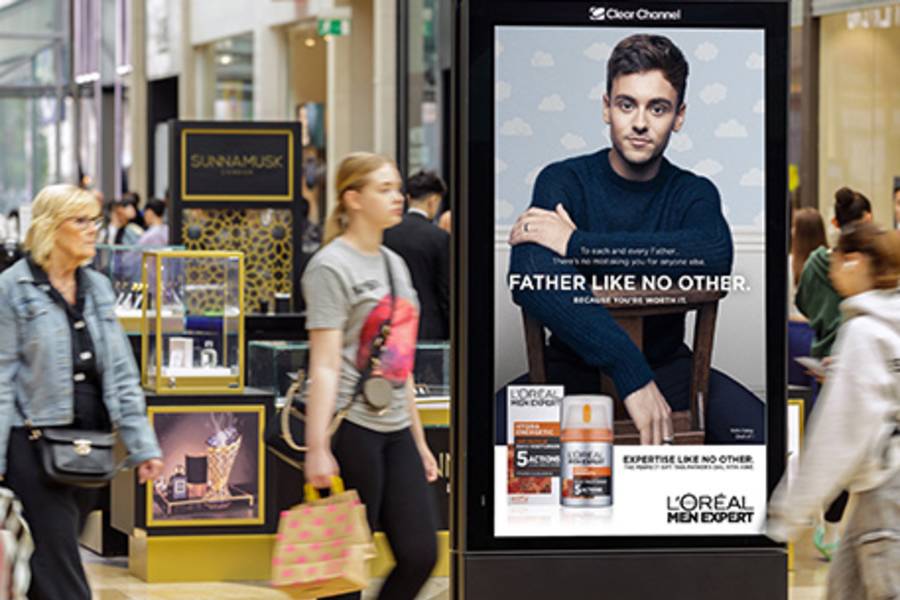 L'oreal fathers day advert on a Malls Live poster in a shopping mall