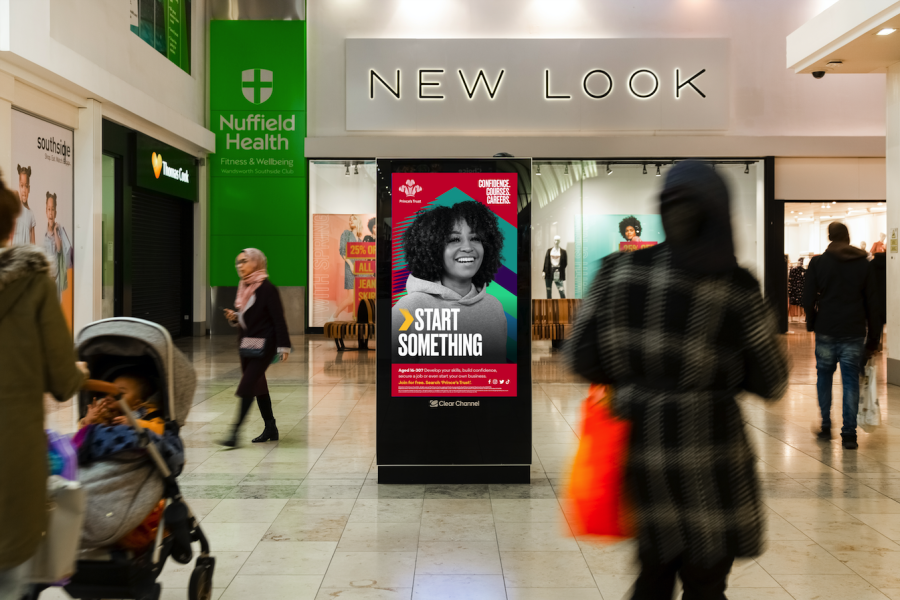 Digital screen in a shopping mall outside New Look showing Prince’s Trust Christmas Campaign