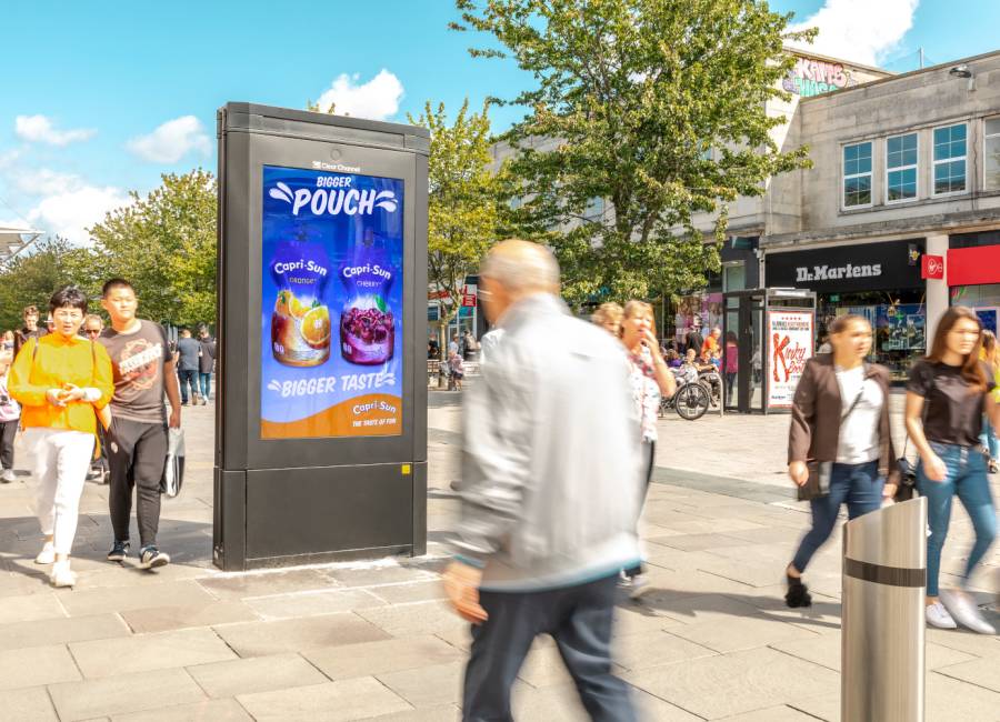 Capri-Sun advert on an Adshel Live screen during a sunny day