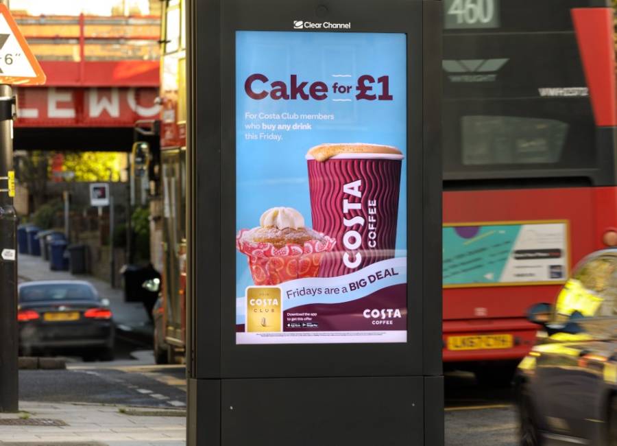 Digital screen on a busy road show Costa ad