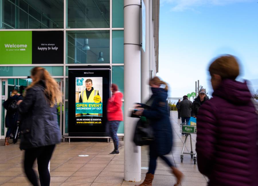 Redcar and Cleveland College ad on digital screen outside Asda